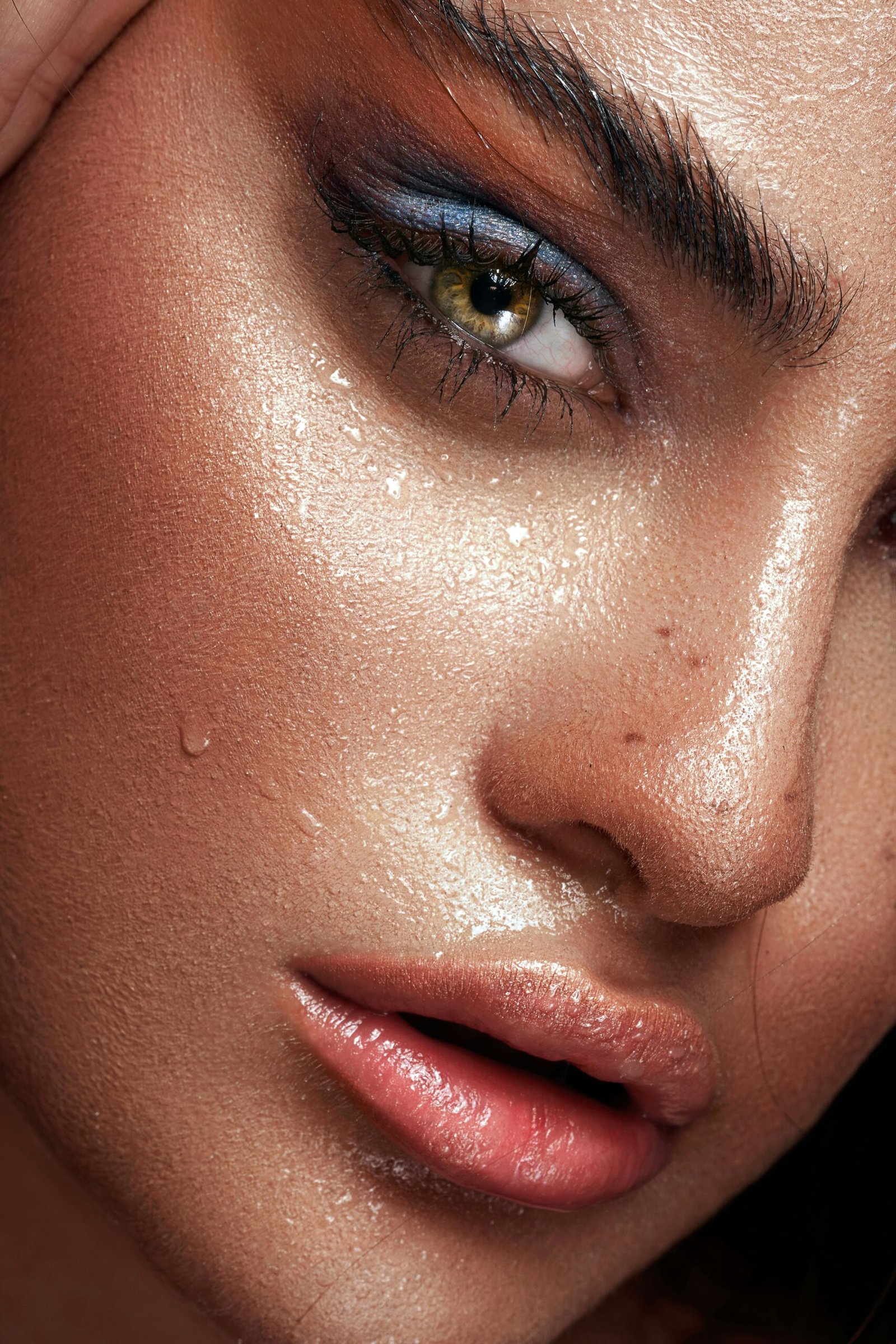 a close up of a woman's face with makeup